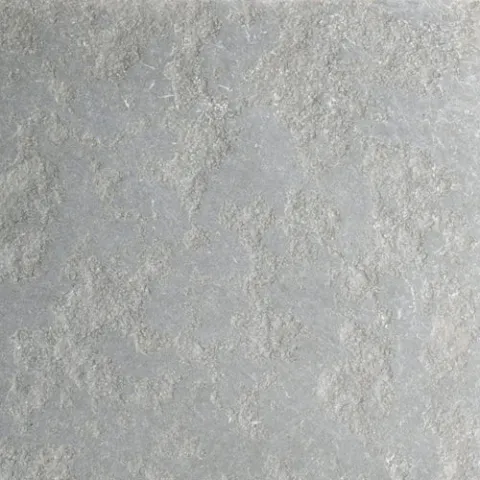 Tumbled antiqued ash limestone sample